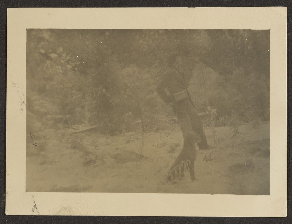 Young Man with Dog in Field by Louis Fleckenstein