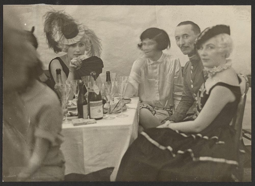 People Seated at a Table at a Banquet by Erich Salomon