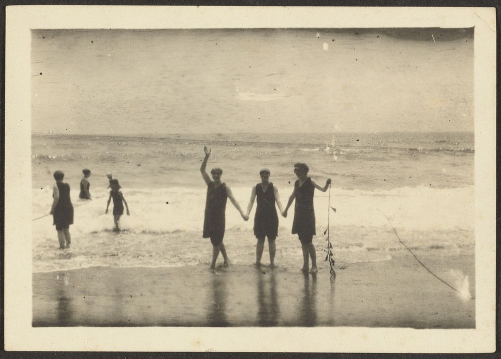 Figures on a Beach Holding Seaweed by Louis Fleckenstein