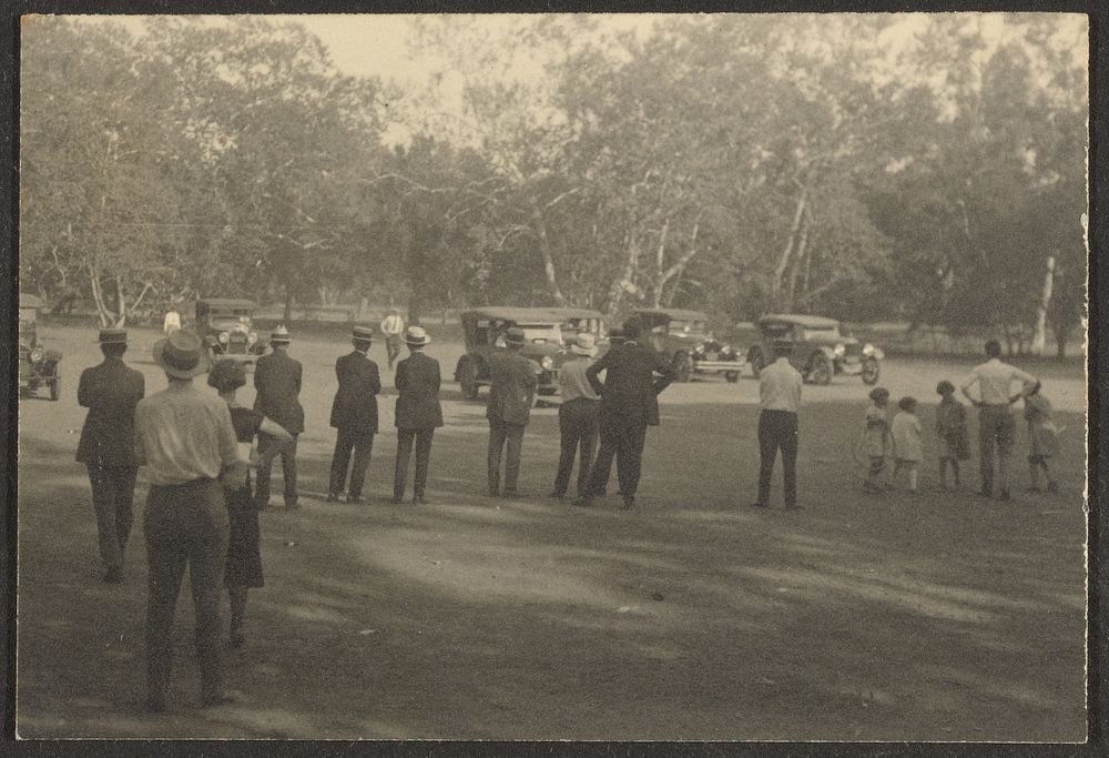 Crowd in Park Looking at Cars by Louis Fleckenstein