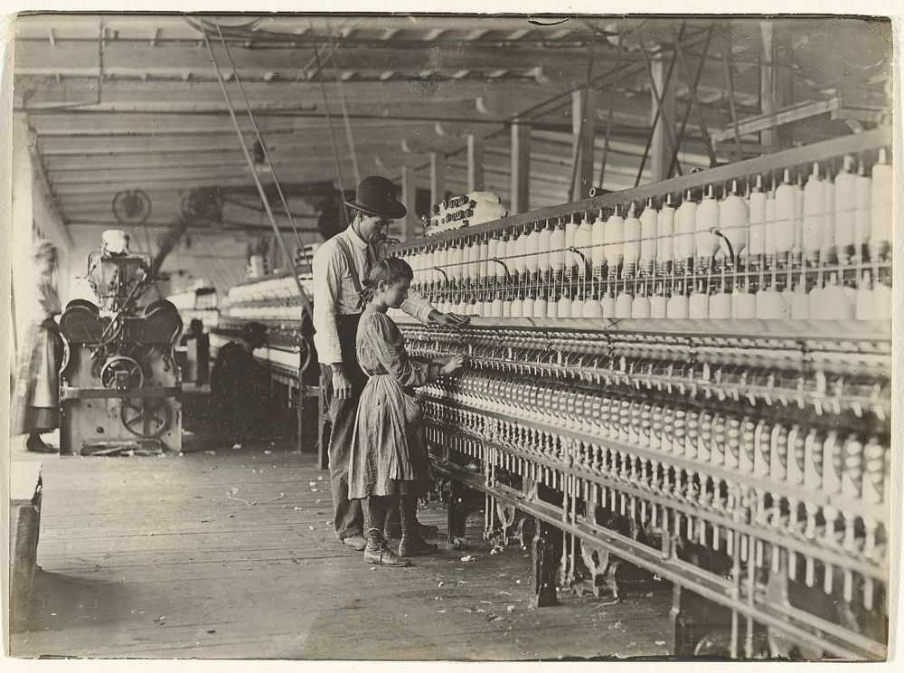 Man with Girl at Spinning Machine, South Carolina Cotton Mill by Lewis W Hine
