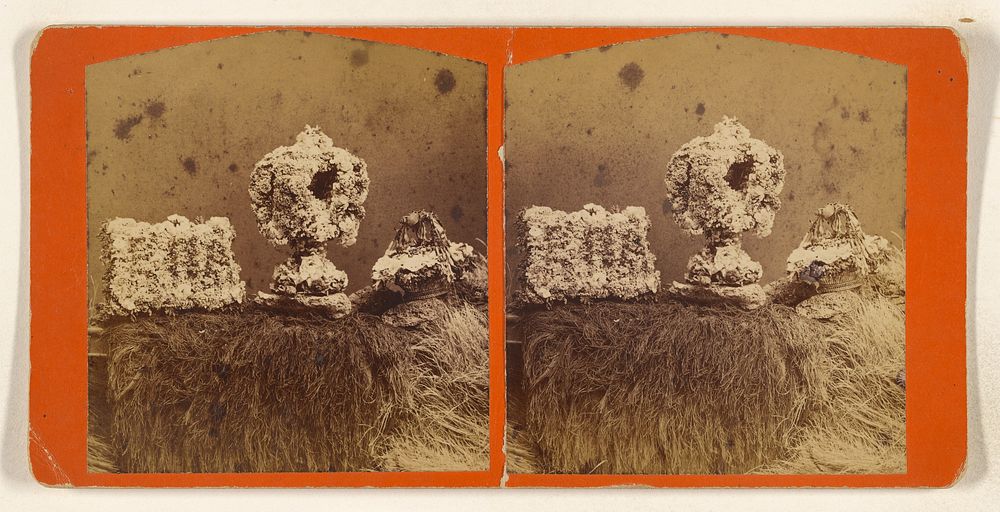 Three dried flower arrangements atop haystacks by Bonta and Curtiss