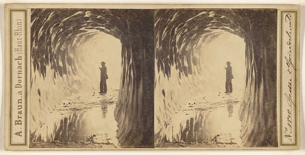 Man standing inside of ice cave by Adolphe Braun