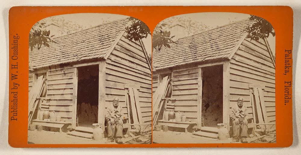 Elder black man seated in from of small cabin, Florida by W H Cushing