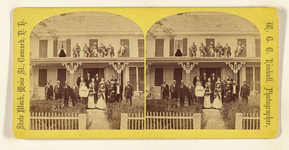 Large group of people in front of house, some seated on roof by Willis G C Kimball