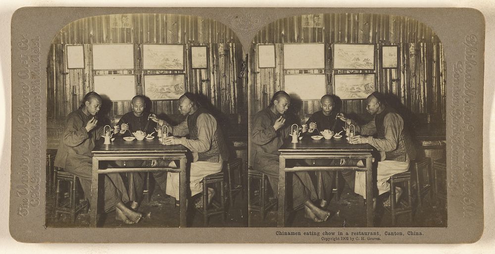 Chinamen eating chow in a restaurant. Canton, China. by Carleton H Graves
