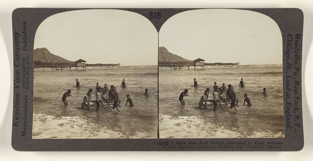 Boys with Surf Boards Indulging in Their Famous Native Sport on Beach at Waikiki, near Honolulu, Hawaii. by Keystone View Co