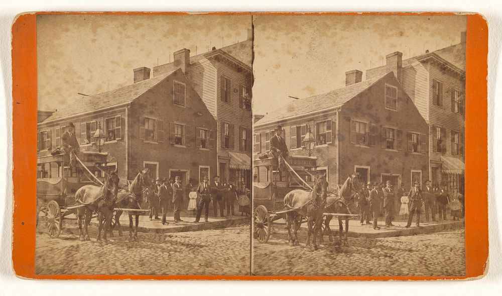 Group of people on street corner, horse-drawn wagon to left by H M Rand and H A Bird