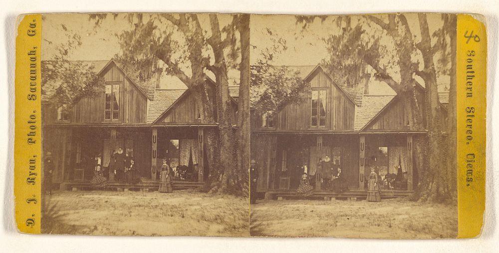 Family in fine dress posed on or near front porch of house, Savannah, Georgia by David J Ryan