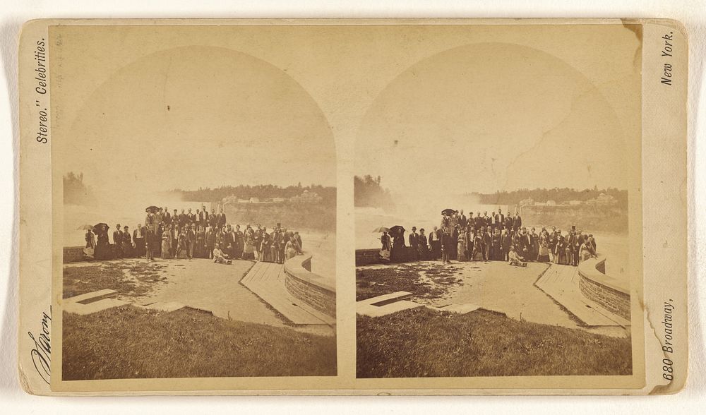 [Large group of people posing in front of Niagara Falls]. by Napoleon Sarony