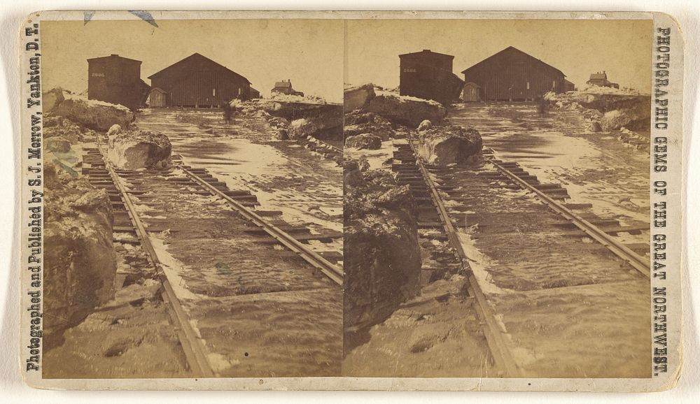 View on the railroad, showing car upset and depot. by Stanley J Morrow