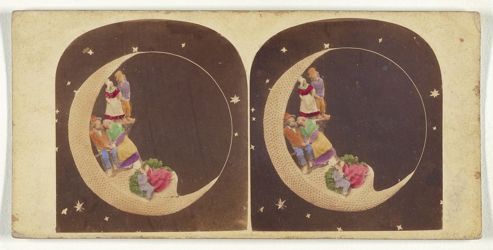 Dolls dressed in native costumes placed within a fake crescent moon by Thomas Sutton