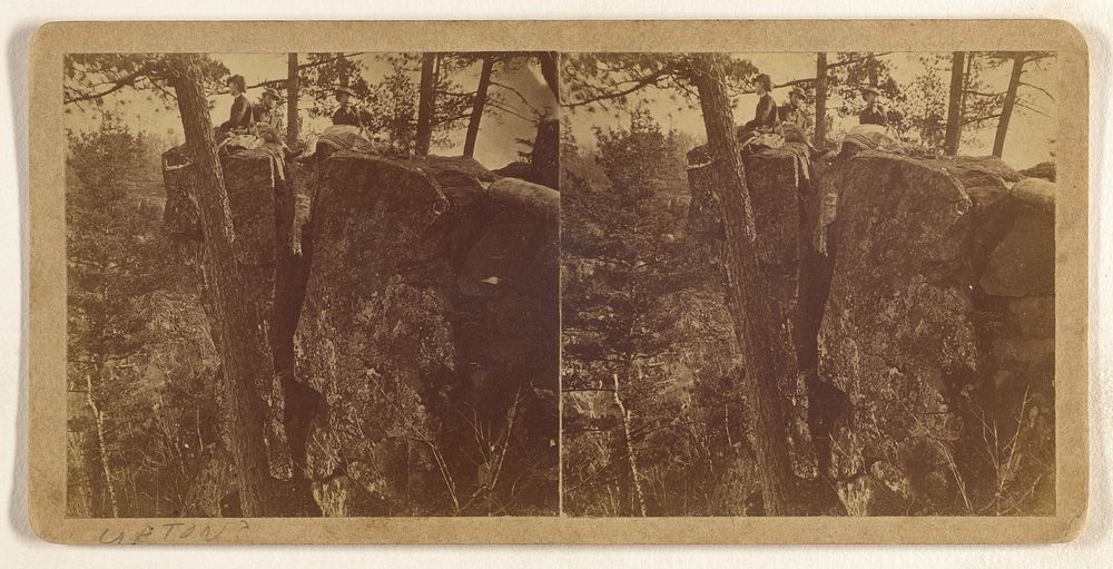People sitting on large rocks in woods by Benjamin Franklin Upton