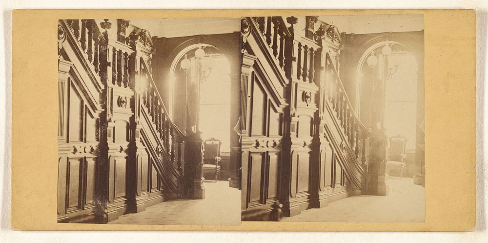 Hallway with ornate banister