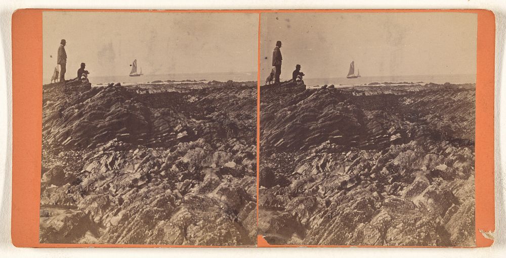 Men on rocky coastline observing ship at sea