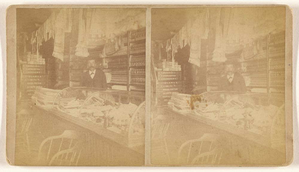 Interior of a country store, man at front counter
