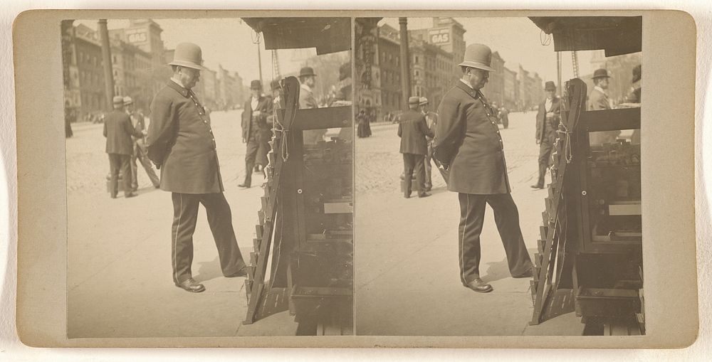 Policeman on Albany, N.Y. street reading newspapers on rack by Julius M Wendt
