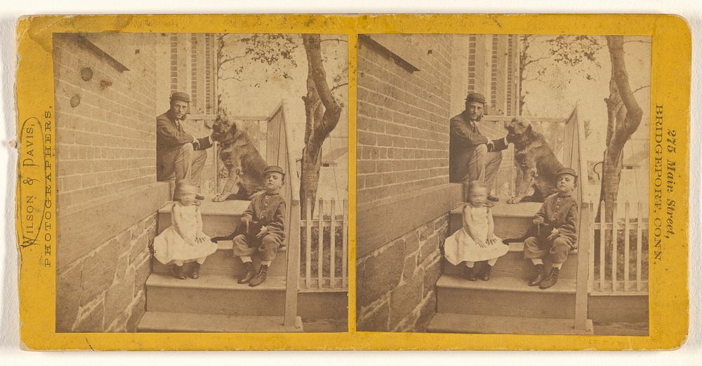 Man petting dog with little boy and girl on steps of house, probably at Bridgeport, Connecticut by Wilson and Davis