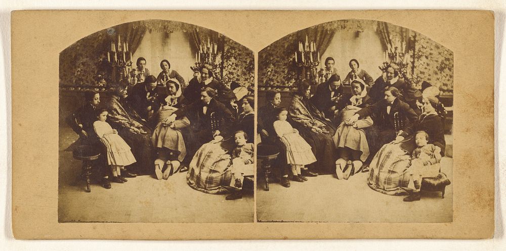 Genre: group of people in a parlor, woman at center holding man on his knee in her lap