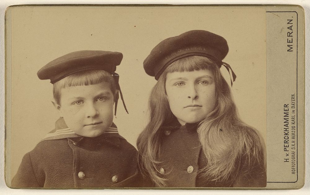 Two unidentified children, a boy and a girl, in sailor suits and sailor hats by H von Perckhammer