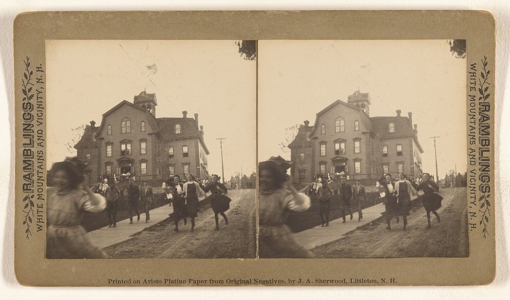 Children running down the street, possibly at Littleton, New Hampshire by J A Sherwood