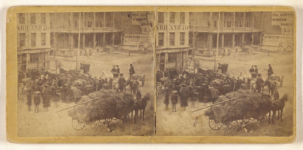 Crowd scene, filled with people and horse-drawn wagons, unidentified American city