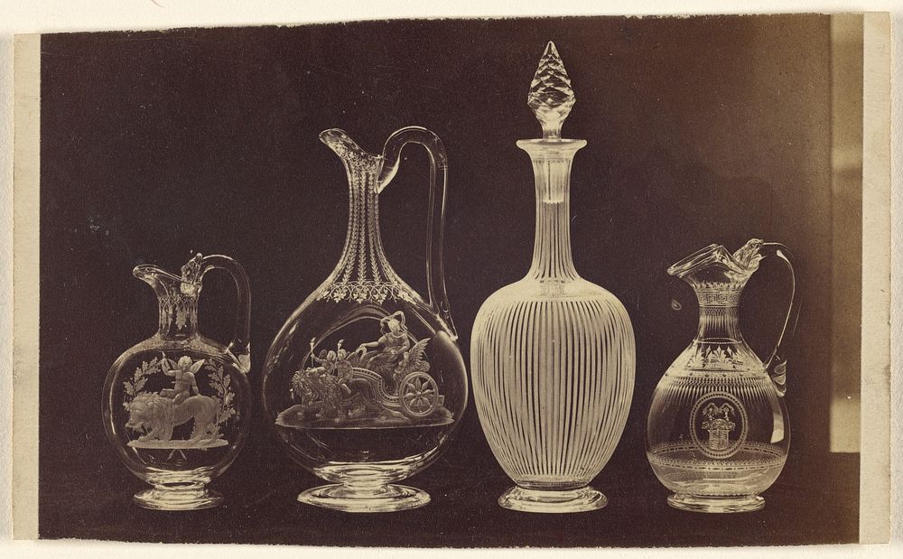 Four ornate cut-crystal vases by Alexander Nichol