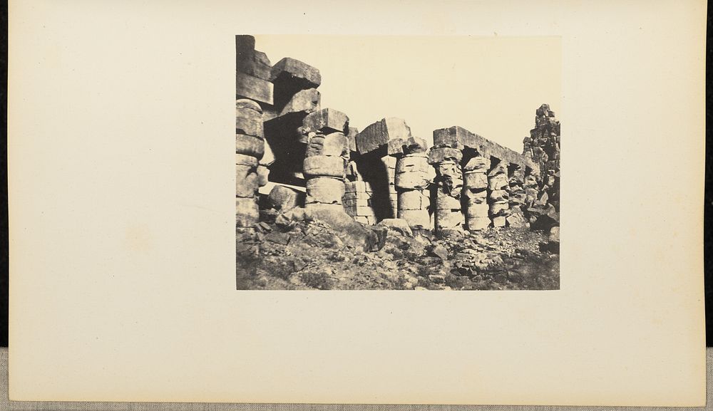 Ruins of a row of large stone pillars by Henry Cammas and André Lefèvre