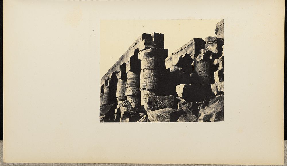 Row of large stone pillars by Henry Cammas and André Lefèvre
