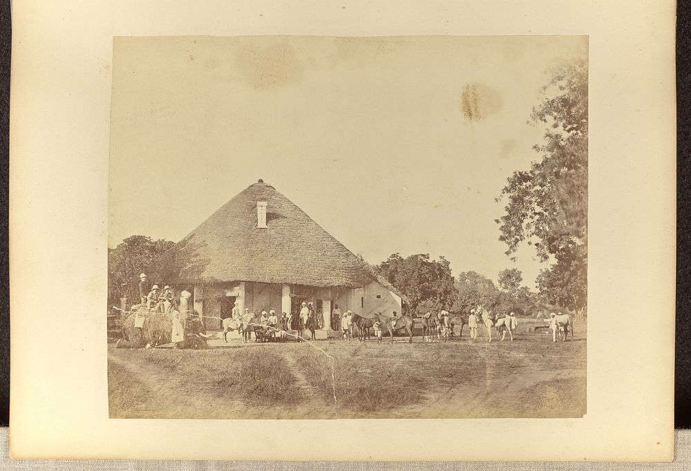Workers outside a house