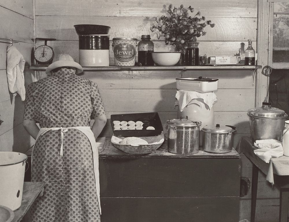 One of the Wilkins family making biscuits for dinner on cornshucking day at Mrs. Fred Wilkins' home near Tallyho, Granville…