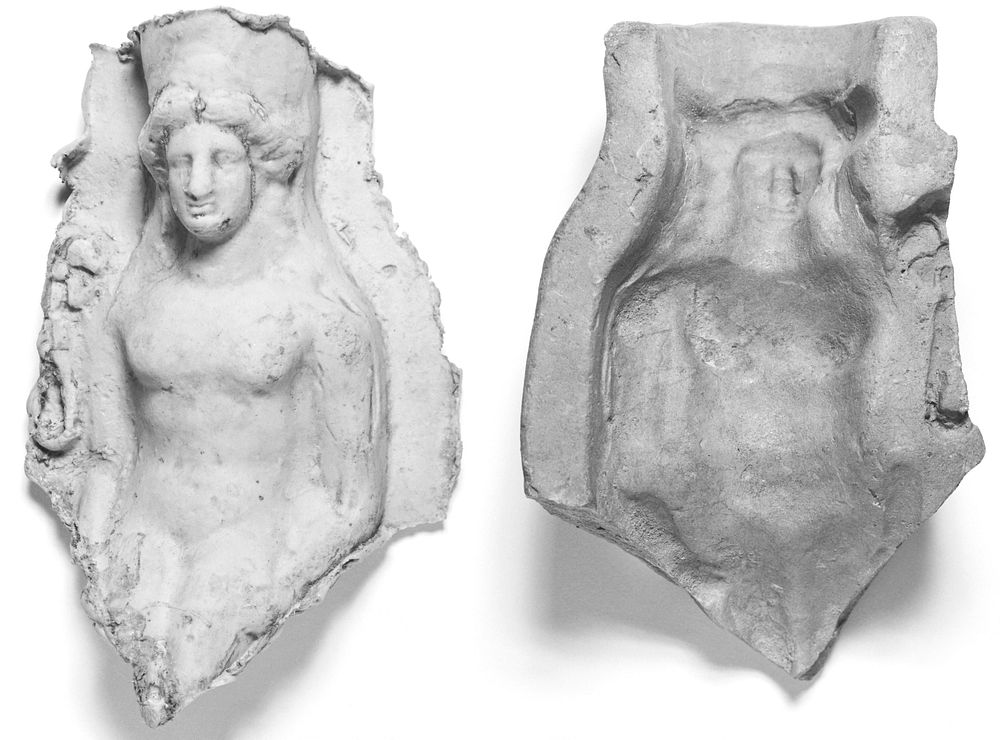 Mold of the Torso and Head of a Frontal Seated Female Wearing a Polos