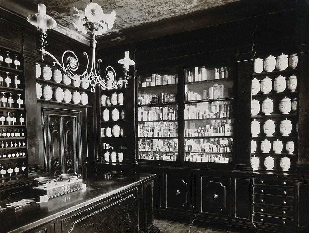 Wellcome Historical Medical Museum, Wigmore Street, London: a display of pharmacy jars. Photograph.