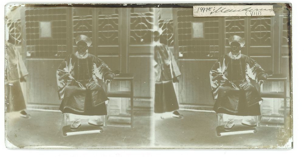 Peking, Pechili province, China: a Manchu official seated. Photograph by John Thomson, 1869.
