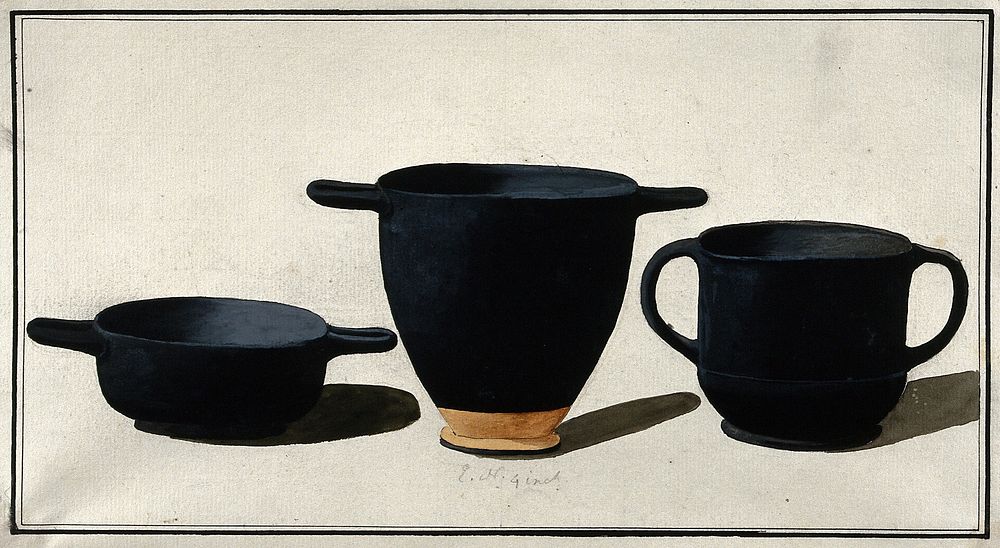 Black Greek drinking cups; left, shallow cup with horizontal handles; middle, tall cup with horizontal handles (kotyle);…