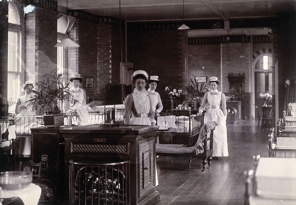St Bartholomew's Hospital, London: nurses in a ward. Photograph, c.1908.