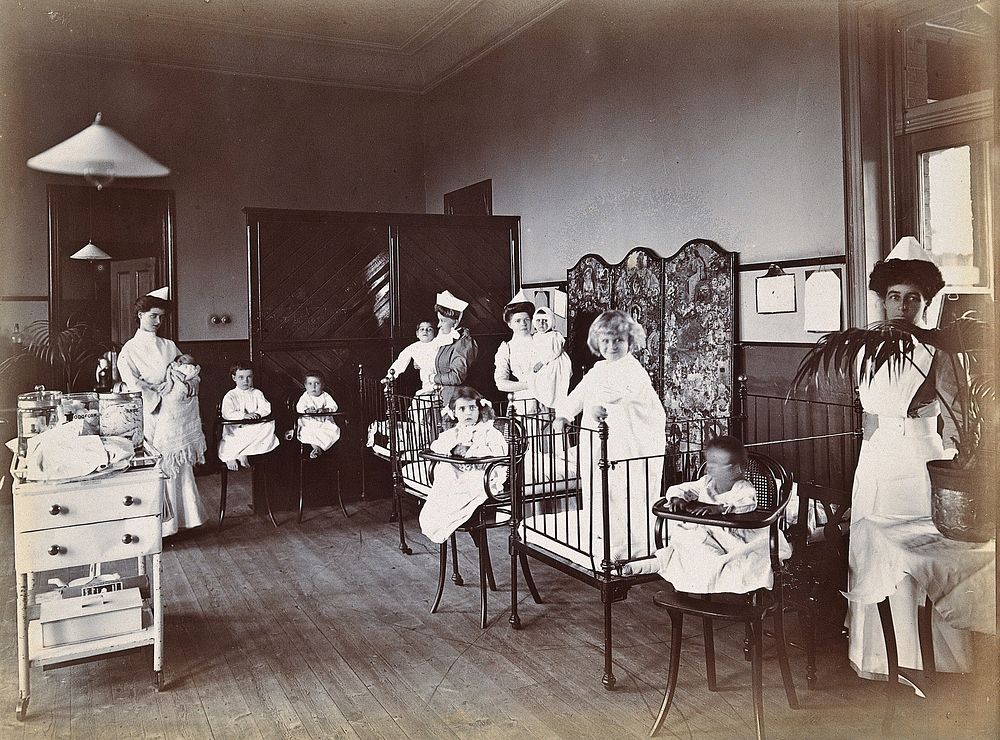 Johannesburg Hospital, South Africa: small hospital ward with nurses and children. Photograph, c. 1905.