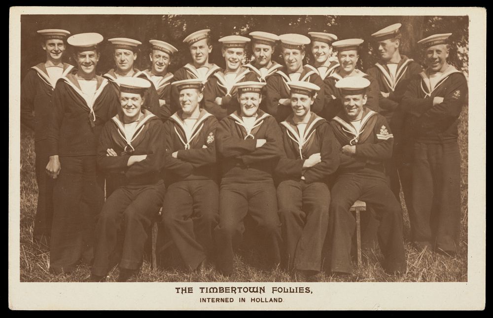 British prisoners of war posing for "The Timbertown Follies", at a prisoner of war camp in Groningen. Photographic postcard…