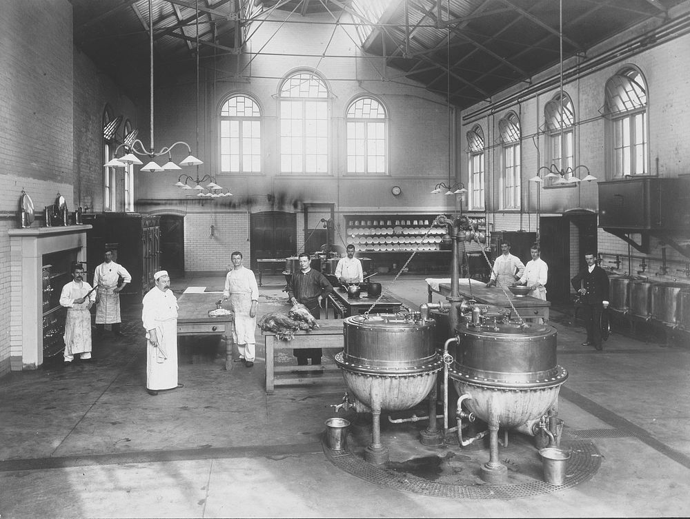 Claybury Asylum, Woodford, Essex: a kitchen. Photograph by the London & County Photographic Co., [1893].