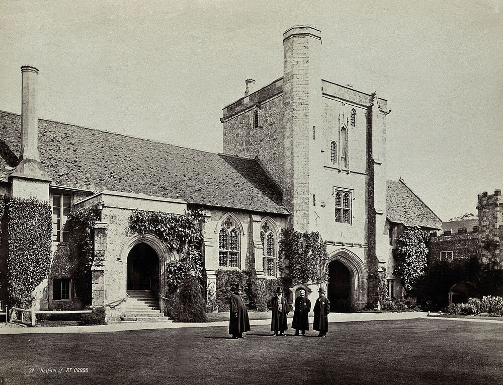 Hospital of Saint Cross, Winchester: four men standing in the courtyard. Photograph, 18--.