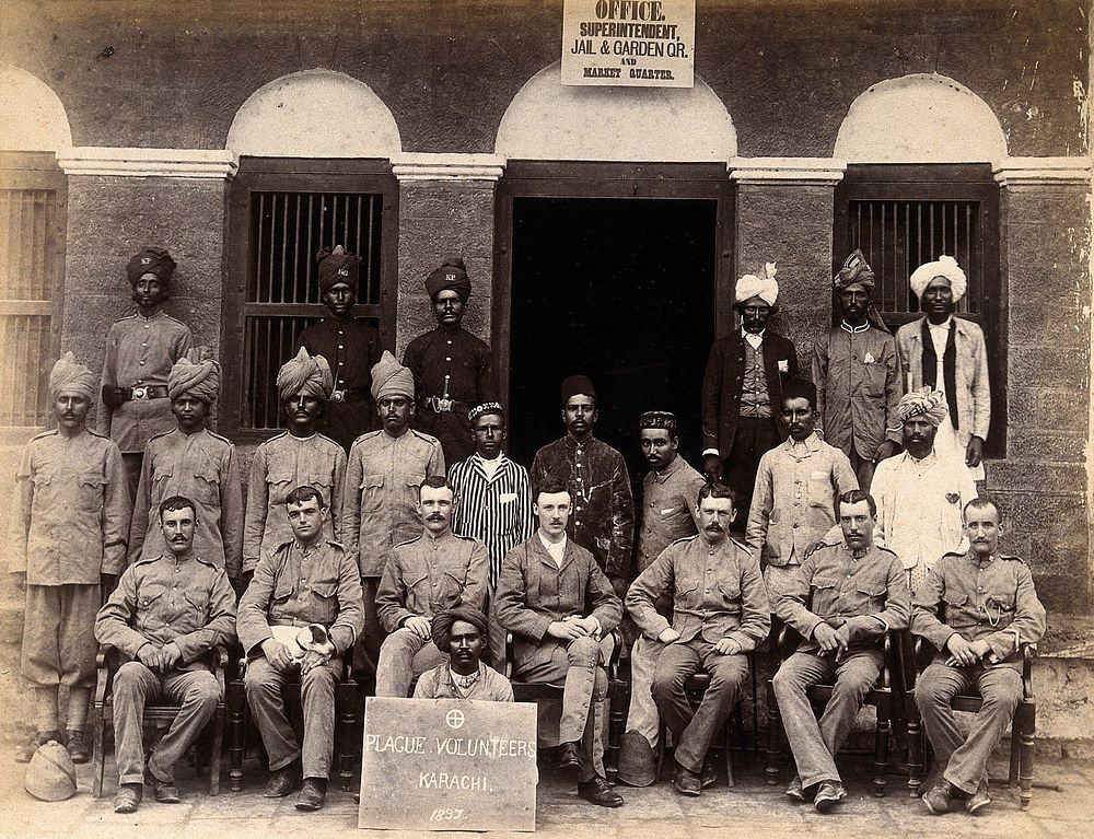Staff who work in the jail or gardens for the Karachi Plague Committee, India. Photograph, 1897.