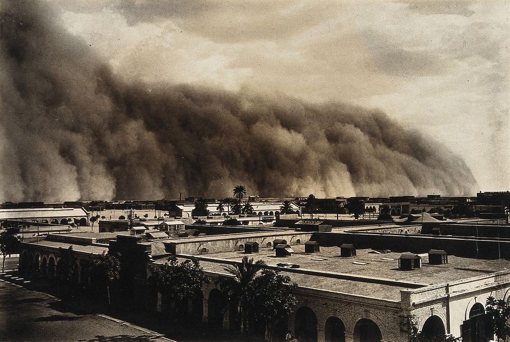 Dust storm over an African  town. Photograph, 1905/1915.