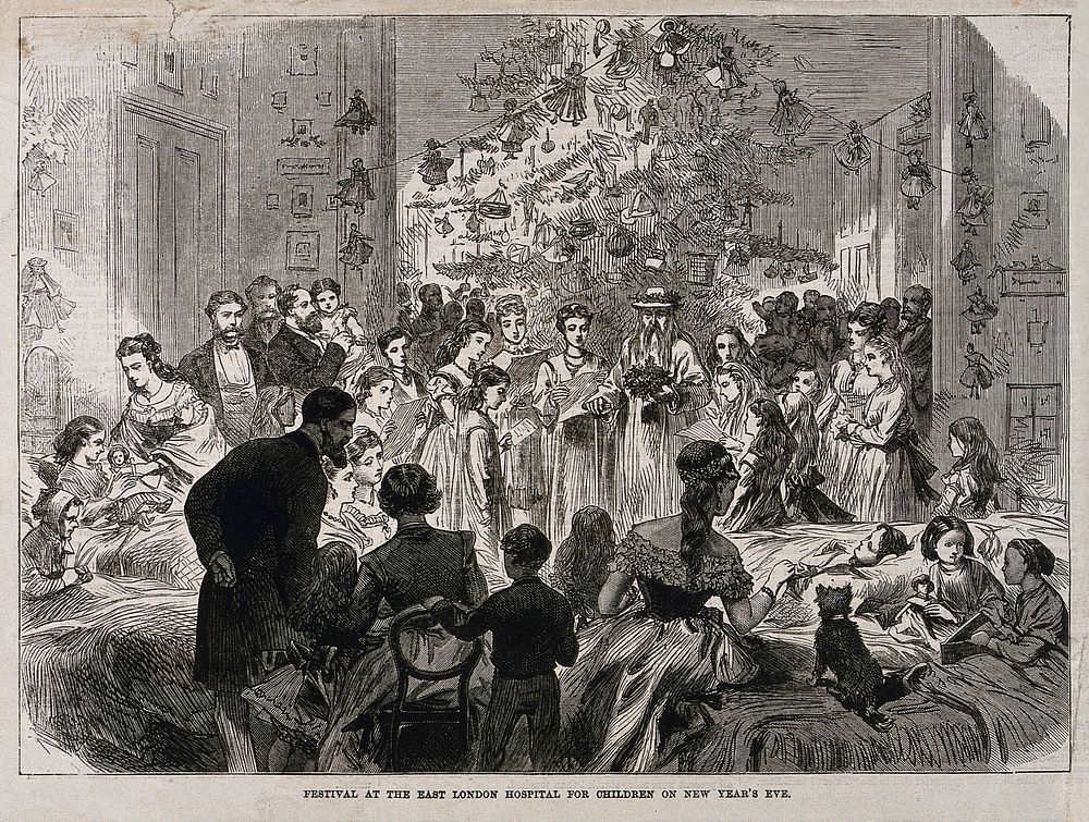 East London Hospital for Children, Shadwell: a party in one of the wards on New Year's Eve. Wood engraving, 1870.