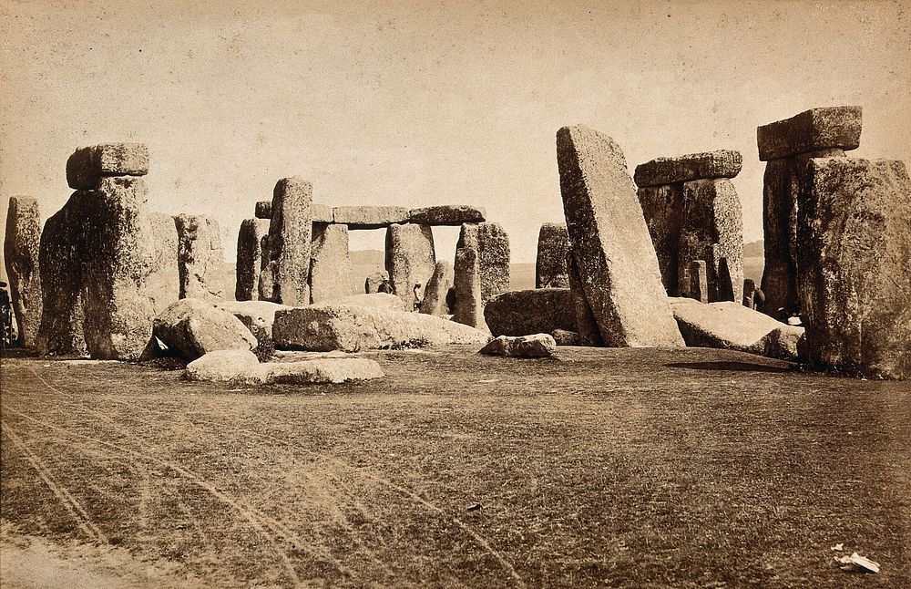 Stonehenge, England: people walking amongst the stones. Photograph, ca. 1880.