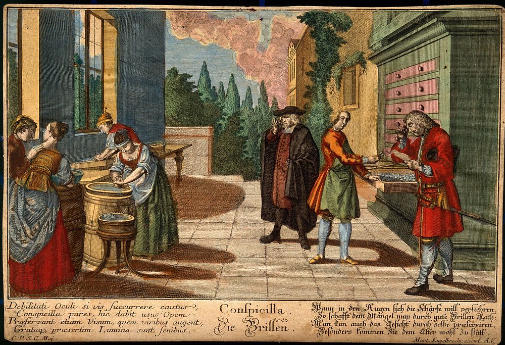 Women grind glass lenses while two customers try spectacles on. Coloured line engraving, 1799.