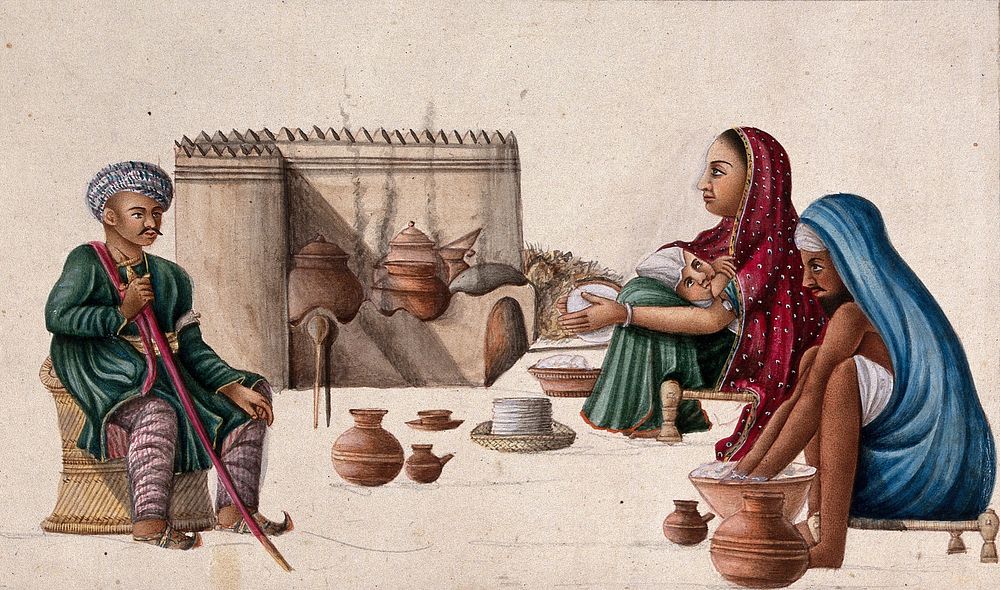 A high ranking man sitting in front of a couple preparing chappatis (bread) and the woman nursing her baby. Gouache painting…