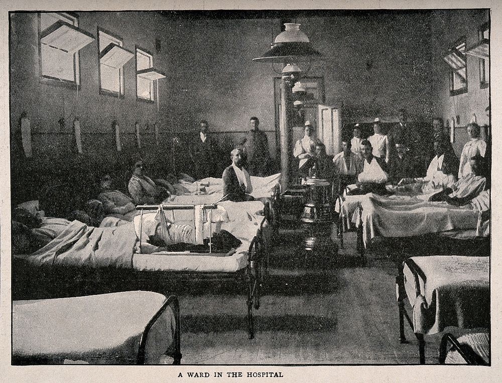 Boer War: a hospital ward with soldiers wounded during the siege of Kimberley, South Africa. Process print after Bennett…