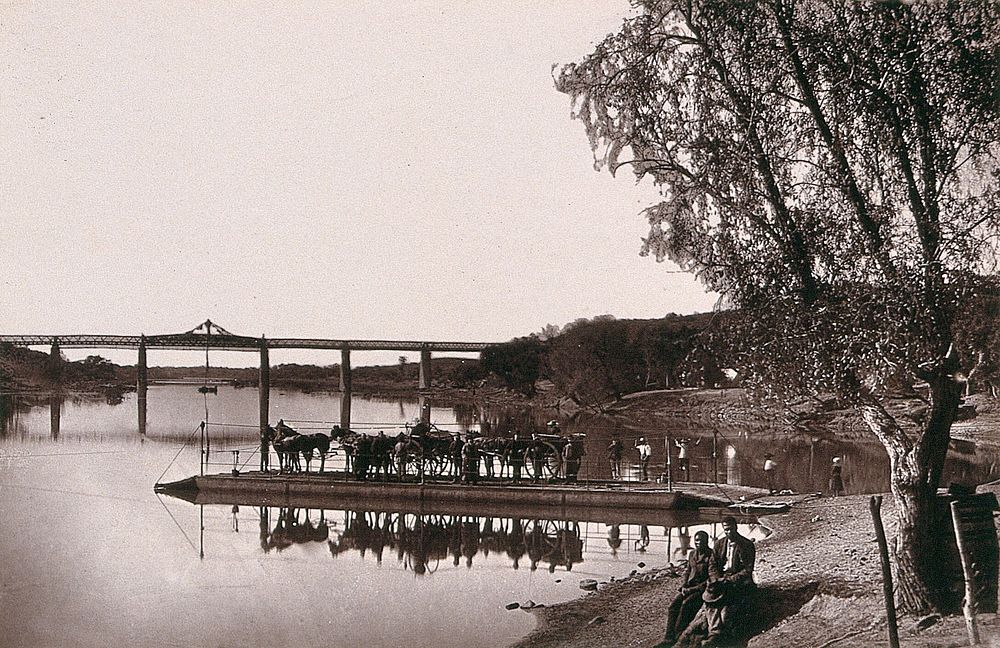 South Africa: Barkly Bridge over the Vaal River and a barge. Woodburytype, 1888, after a photograph by Robert Harris.