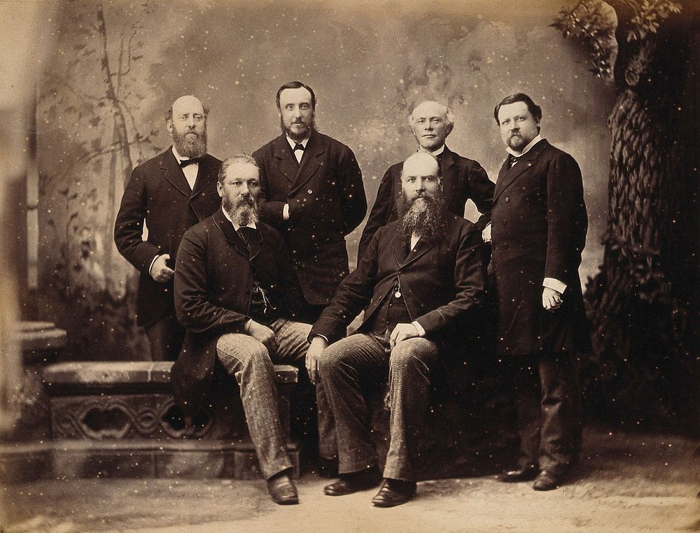 Six American  men: standing, left to right: R. Cornelious, W. Johnson, Edward Paul, A. Leroux; seated, left to right: R.…
