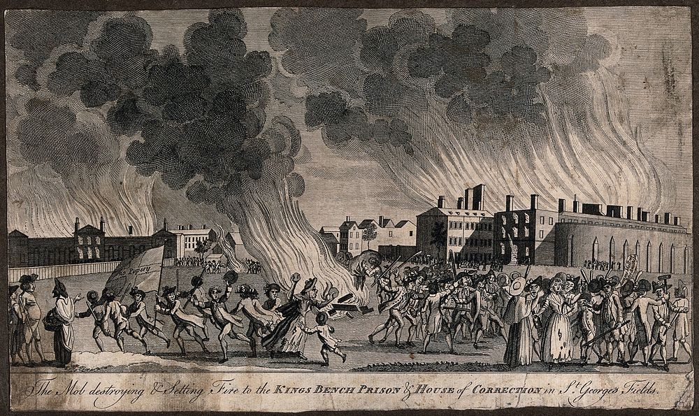 St George's Fields, Southwark: anti-Catholic rioters in the Gordon riots wielding sticks, displaying banners, and setting…